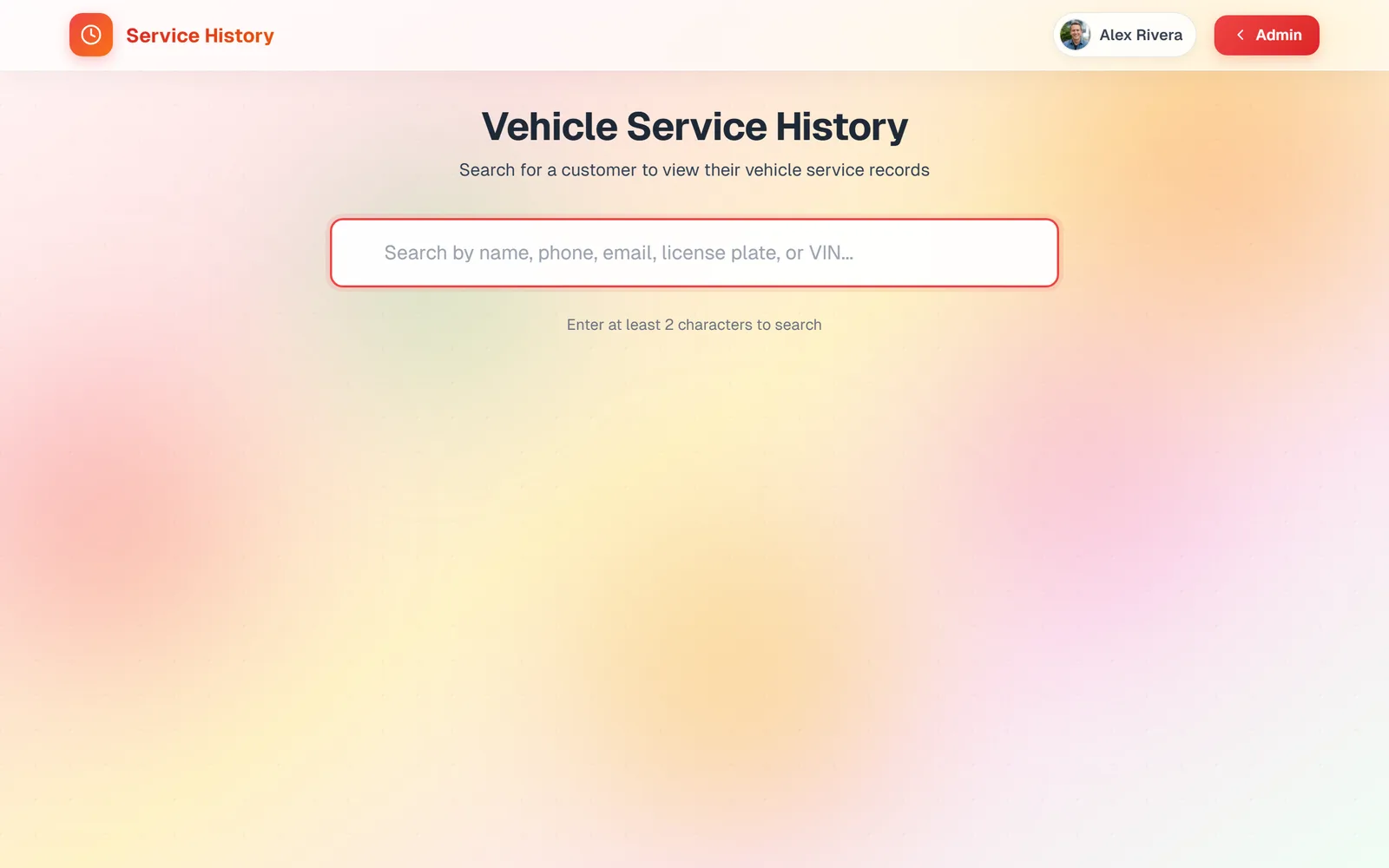 The Vehicle Service History page with one search box that accepts name, phone, email, license plate, or VIN